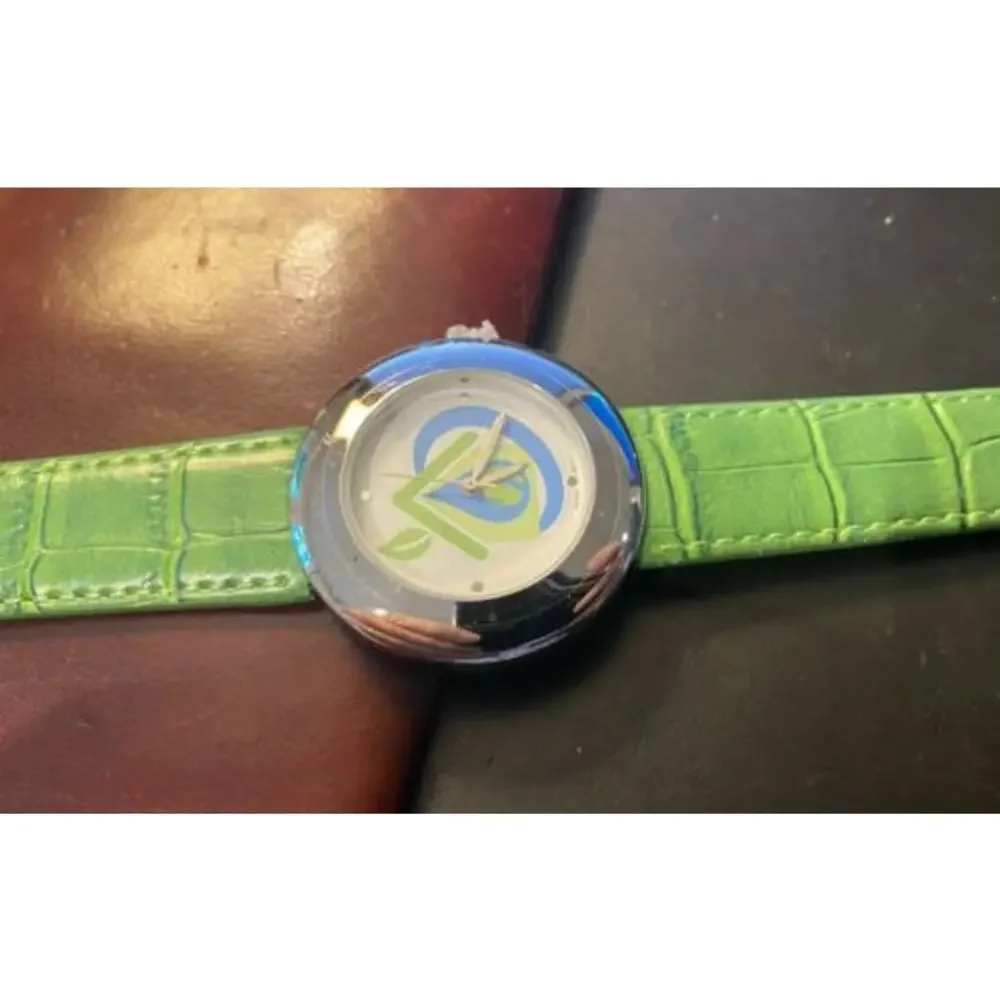 Women's 40mm Silver Tone Norwex Watch, Green Band with Company Logo Face